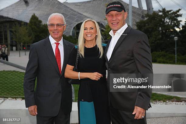 Axel Schulz attends with Patrizia Schulz and Franz Beckenbauer the Laureus Sport for Good Night 2013 at Munich Olympiahalle on September 20, 2013 in...