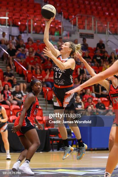 Sami Whitcomb of the Fire shoots during the WNBL match between Perth Lynx and Townsville Fire at Bendat Basketball Stadium, on November 25 in Perth,...