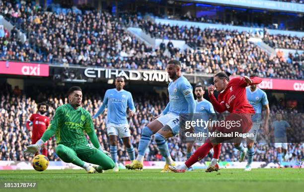 Darwin Nunez of Liverpool shoots but misses during the Premier League match between Manchester City and Liverpool FC at Etihad Stadium on November...