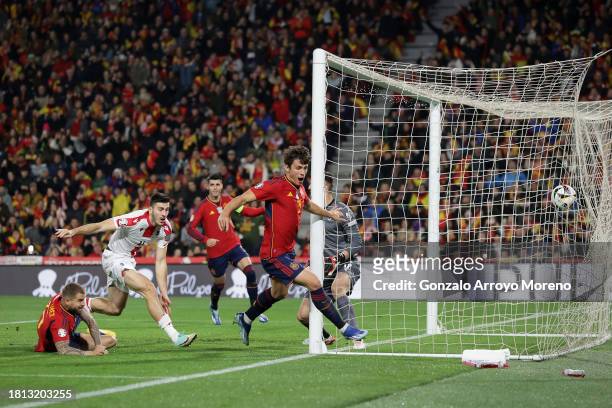 Robin Le Normand of Spain celebrates scoring their opening goal during the UEFA EURO 2024 European qualifier match between Spain and Georgia at Jose...