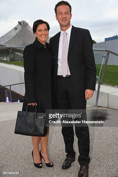 Fredi Bobic arrives with Britta Bobic at the red carpet prior the Laureus Sport for Good Night 2013 at Munich Olympiahalle on September 20, 2013 in...