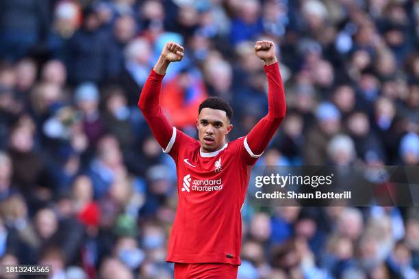 Trent Alexander-Arnold of Liverpool celebrates after scoring the team's first goal during the Premier League match between Manchester City and...