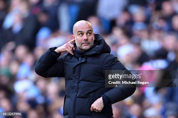 Pep Guardiola, Manager of Manchester City, gestures during the Premier League match between Manchester City and Liverpool FC at Etihad Stadium on...
