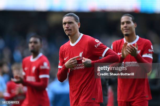 Darwin Nunez of Liverpool points to the badge of Liverpool on his shirt following the Premier League match between Manchester City and Liverpool FC...