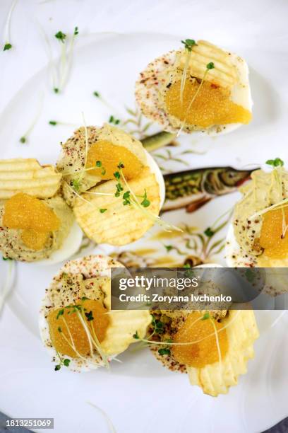 easter deviled eggs..style rustic - easter deviled eggs stock pictures, royalty-free photos & images