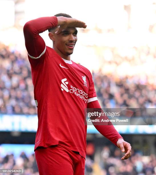 Trent Alexander-Arnold of Liverpool celebrates after scoring the equalising goal during the Premier League match between Manchester City and...