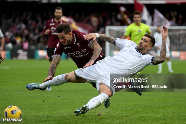 Mattia Zaccagni of SS Lazio compete for the ball with Pasquale Mazzocchi of US Salernitana during the Serie A TIM match between US Salernitana and SS...