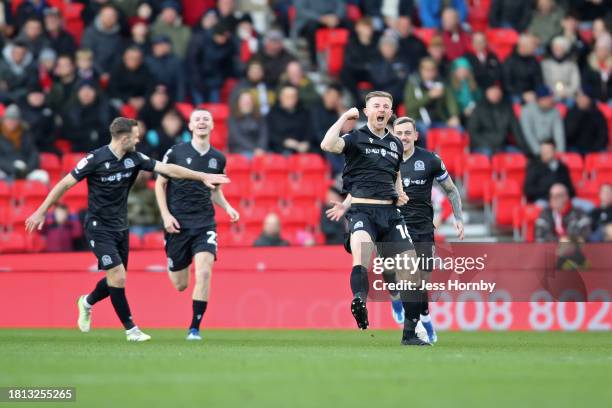 Scott Wharton of Blackburn Rovers celebrates after scoring the team's first goal during the Sky Bet Championship match between Stoke City and...