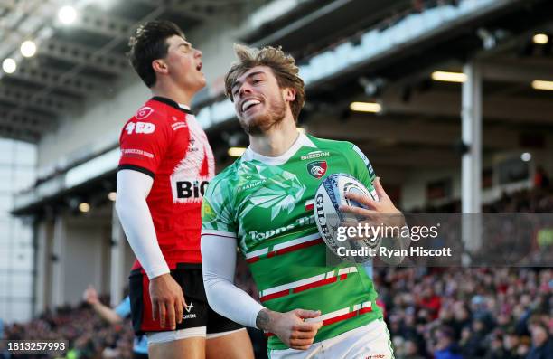 Ollie Hassell-Collins of Leicester Tigers celebrates scoring their sides first try during the Gallagher Premiership Rugby match between Gloucester...