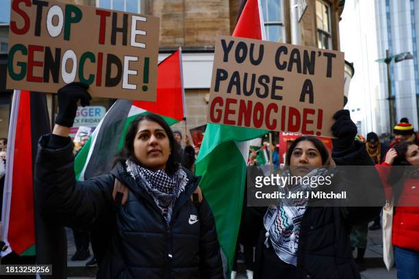 Protesters participate in a Pro-Palestinian rally during a day of action on November 25, 2023 in Glasgow, Scotland. The protest was organised by the...