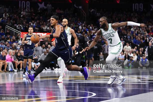 Paolo Banchero of the Orlando Magic drives to the basket against the Boston Celtics during the second half at Amway Center on November 24, 2023 in...