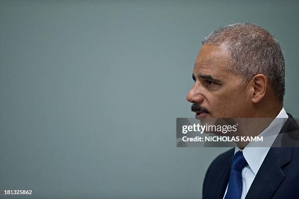 Attorney General Eric Holder addresses the Congressional Black Caucus Annual Legislative Conference during a public policy forum on voting rights in...