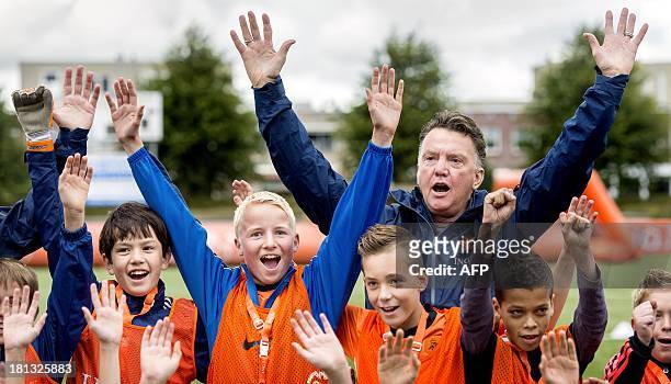 The head coach of the Dutch national football team Louis van Gaal poses for a photograph as he attends the selection day for ball boys and girls, who...