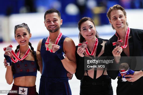 Gold medalists Lilah Fear and Lewis Gibson of Great Britain and bronze medalists Allison Reed and Saulius Ambrulevicius of Lithuania pose at the...