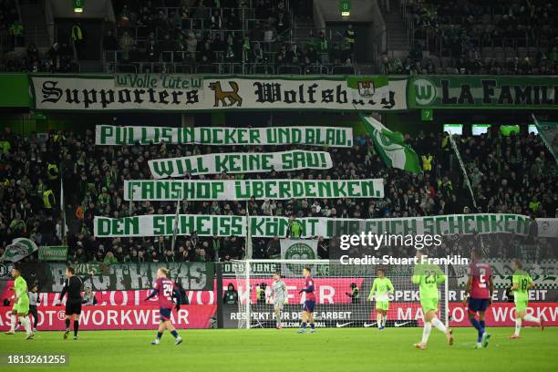 General view of VfL Wolfsburg fans holding up a banner during the Bundesliga match between VfL Wolfsburg and RB Leipzig at Volkswagen Arena on...