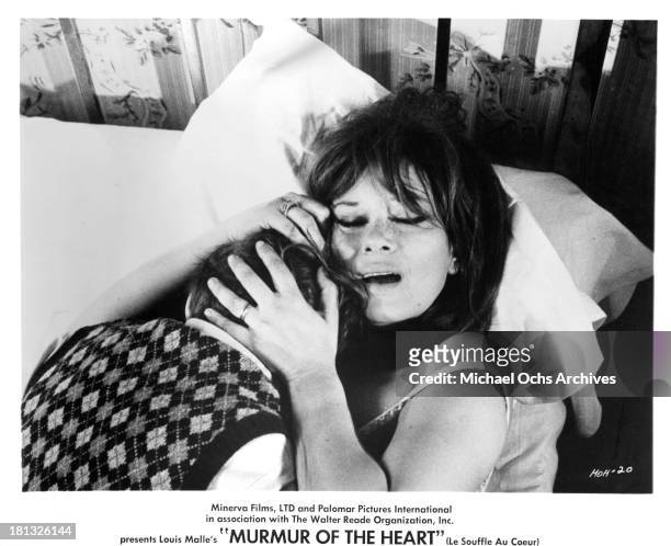 Actor Benoet Ferreux and actress Lea Massari on set of the movie "Murmur of the Heart" in 1971.