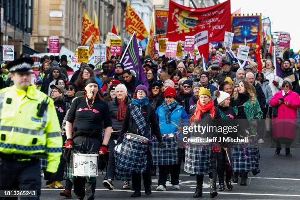 People take part in a St Andrew's Day anti-racism and anti-fascism rally on November 25, 2023 in Glasgow, Scotland. Trade unions and community...