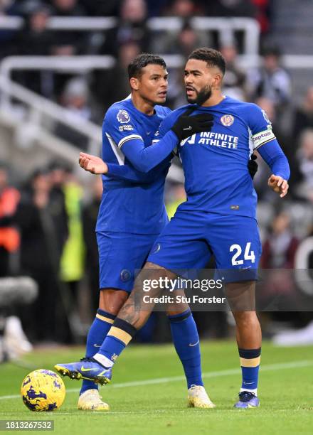 Reece James of Chelsea interacts with teammate Thiago Silva during the Premier League match between Newcastle United and Chelsea FC at St. James Park...