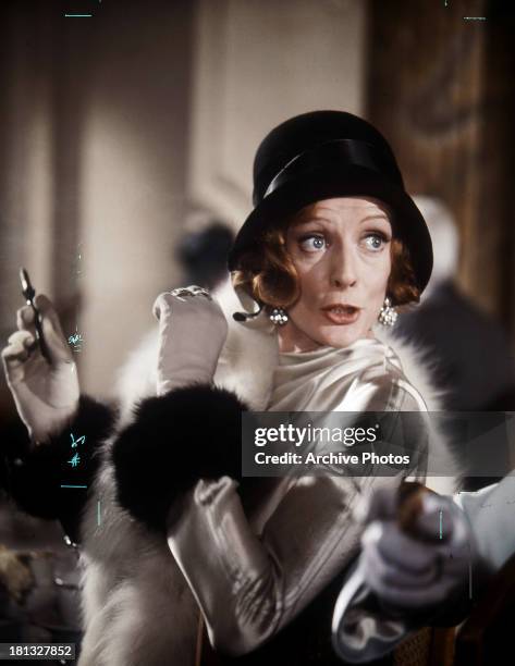 Maggie Smith is startled in a scene from the film 'Travels With My Aunt', 1972.