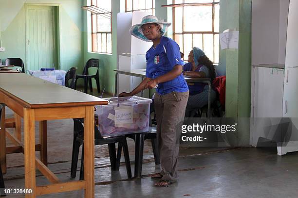 Woman casts her vote at Nsongweni High School polling station in Nhlangano, South of Swaziland on September 20, 2013. Voters in Africa's tiny...