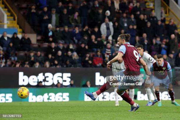 Jay Rodriguez of Burnley scores the team's first goal from a penalty kick during the Premier League match between Burnley FC and West Ham United at...