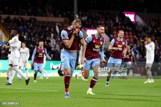 Jay Rodriguez of Burnley celebrates after scoring the team's first goal from a penalty kick during the Premier League match between Burnley FC and...