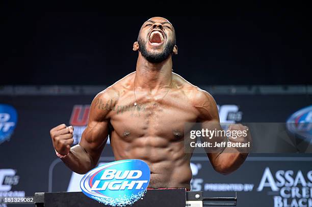 Light heavyweight champion Jon 'Bones' Jones weighs in during the UFC 165 weigh-in at the Maple Leaf Square on September 20, 2013 in Toronto,...