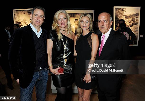 Collection owner Gert Elfering, Anke Degenhard, Kate Moss and Christie's director of photographs Philippe Garner attend a private view of 'Kate Moss:...