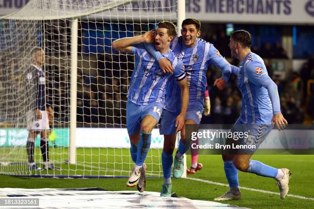 Ben Sheaf of Coventry celebrates with team mates Bobby Thomas and Liam Kitching after scoring their third goal during the Sky Bet Championship match...