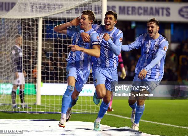 Ben Sheaf of Coventry celebrates with team mates Bobby Thomas and Liam Kitching after scoring their third goal during the Sky Bet Championship match...