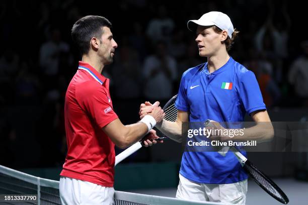 Jannik Sinner of Italy celebrates winning match point during the Semi-Final match against Novak Djokovic of Serbia in the Davis Cup Final at Palacio...