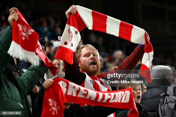 Brentford fans show their support prior to the Premier League match between Brentford FC and Arsenal FC at Gtech Community Stadium on November 25,...