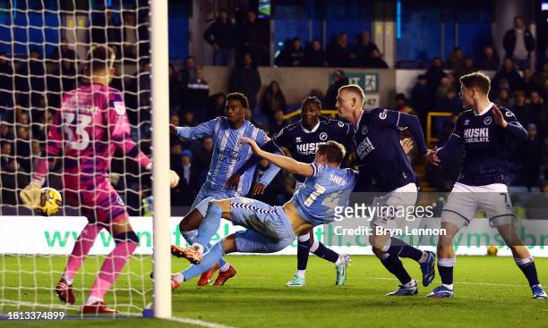 Ben Sheaf of Coventry scores their third goal during the Sky Bet Championship match between Millwall and Coventry City at The Den on November 25,...