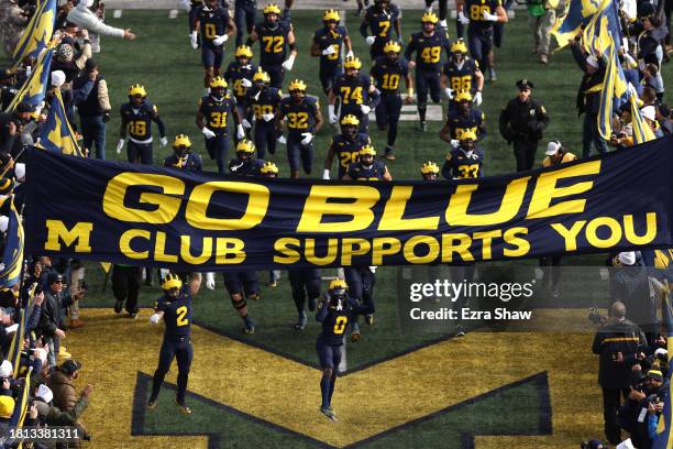 The Michigan Wolverines take the field prior to in the game against the Ohio State Buckeyes at Michigan Stadium on November 25, 2023 in Ann Arbor,...