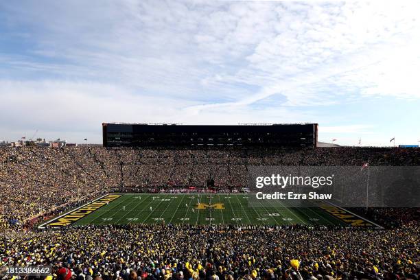 The Michigan Wolverines kick the ball off to Ohio State Buckeyes to start the first quarter in the game at Michigan Stadium on November 25, 2023 in...