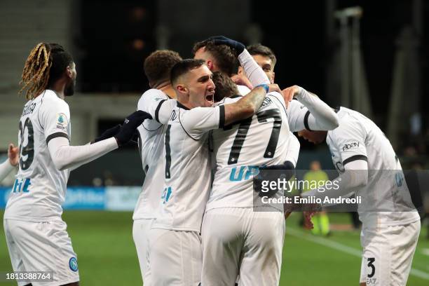 Amir Rrahmani of SSC Napoli celebrates with teammates after scoring the team's first goal which is later disallowed during the Serie A TIM match...