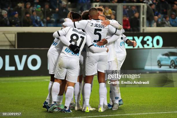 Khvicha Kvaratskhelia of SSC Napoli celebrates with teammates after scoring the team's first goal during the Serie A TIM match between Atalanta BC...