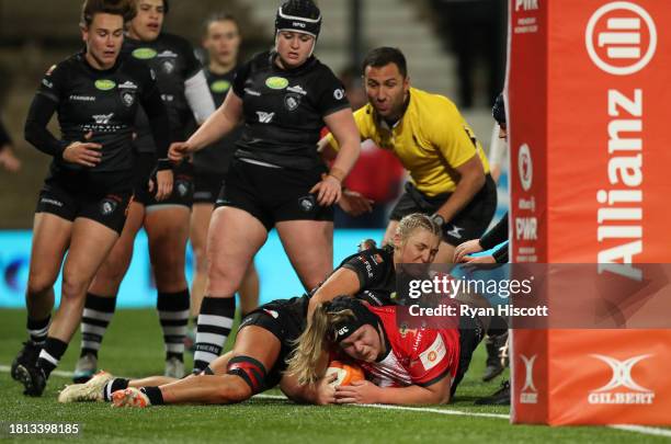 El Perry of Gloucester Hartpury scores their sides third try during the Allianz Premiership Women's Rugby match between Gloucester-Hartpury and...