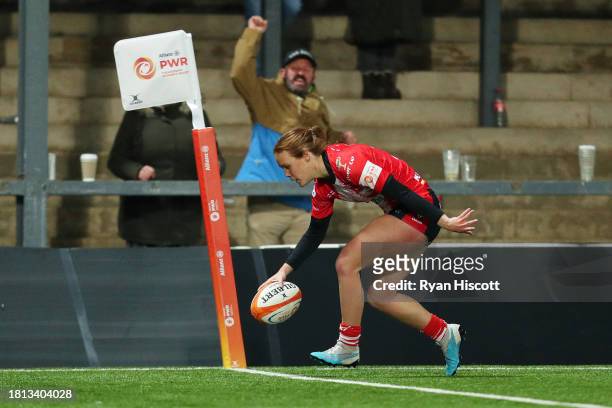Emma Sing of Gloucester Hartpury scores their sides fifth try during the Allianz Premiership Women's Rugby match between Gloucester-Hartpury and...