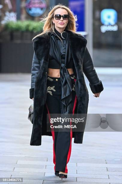 Amanda Holden is seen leaving Global Studios on November 30, 2023 in London, United Kingdom.