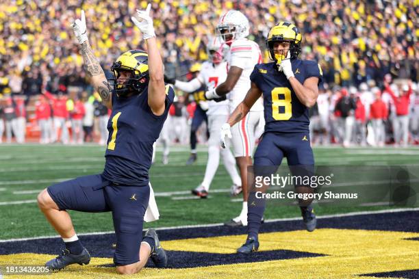 Roman Wilson of the Michigan Wolverines celebrates after scoring a touchdown against the Ohio State Buckeyes during the second quarter in the game at...