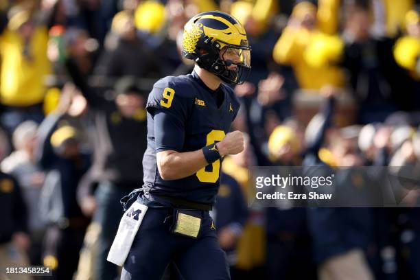 McCarthy of the Michigan Wolverines celebrates after Blake Corum scored a touchdown against the Ohio State Buckeyes during the first quarter in the...