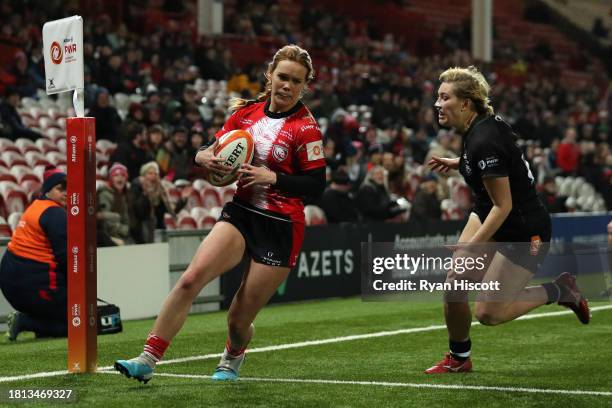 Mia Venner of Gloucester Hartpury scores their sides eighth try during the Allianz Premiership Women's Rugby match between Gloucester-Hartpury and...