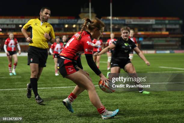 Mia Venner of Gloucester Hartpury scores their sides eighth try during the Allianz Premiership Women's Rugby match between Gloucester-Hartpury and...