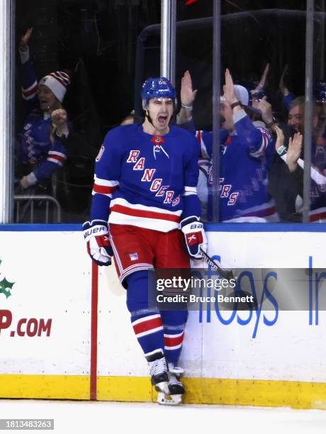 Chris Kreider of the New York Rangers scores a first period shorthanded goal against the Boston Bruins at Madison Square Garden on November 25, 2023...