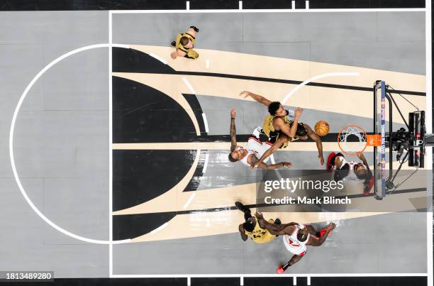 DeMar DeRozan of the Chicago Bulls goes to the basket against Scottie Barnes of the Toronto Raptors during the first half of their NBA In-Season...