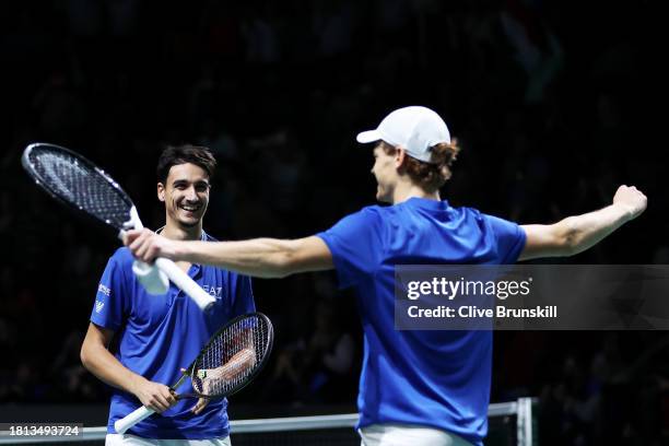 Jannik Sinner celebrates winning match point with Lorenzo Sonego of Italy during the Semi-Final doubles match against Miomir Kecmanovic and Novak...