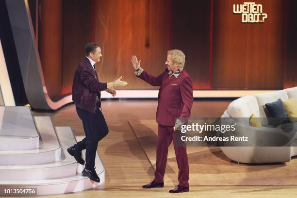 Thomas Gottschalk and Matthias Schweighöfer speak on stage during the "Wetten, Dass ...?" tv show on November 25, 2023 in Offenburg, Germany.