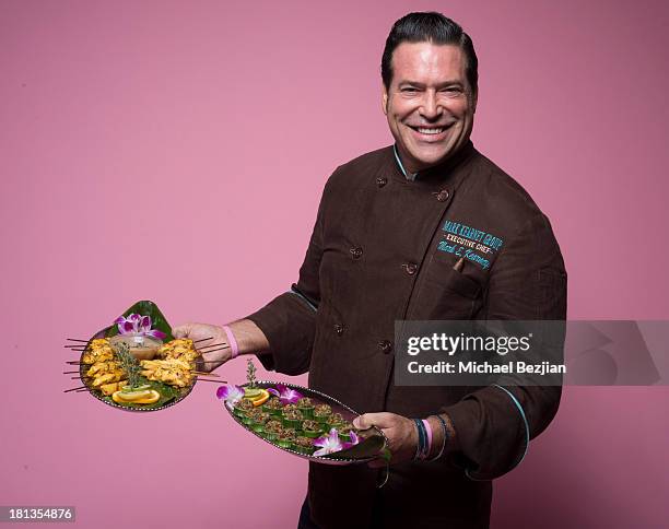 Celebrity chef Mark Kearney shows of his creations at the Mark Kearney Group "Iced Out" Luxury Emmy Suite on September 19, 2013 in Los Angeles,...