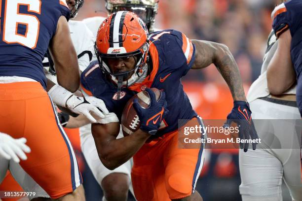 LeQuint Allen of the Syracuse Orange runs the ball during the second quarter against the Wake Forest Demon Deacons at JMA Wireless Dome on November...